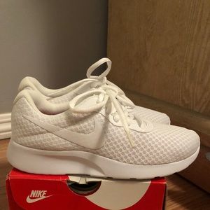 Nikes women’s Tanjun sneakers.